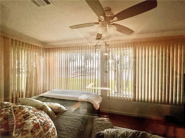 sunroom / solarium with ceiling fan