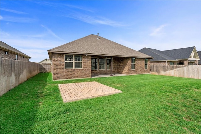 3008 Alpha Ct, Bryan, TX 77808 - rear view of house featuring brick siding, a patio area, and a shingled roof