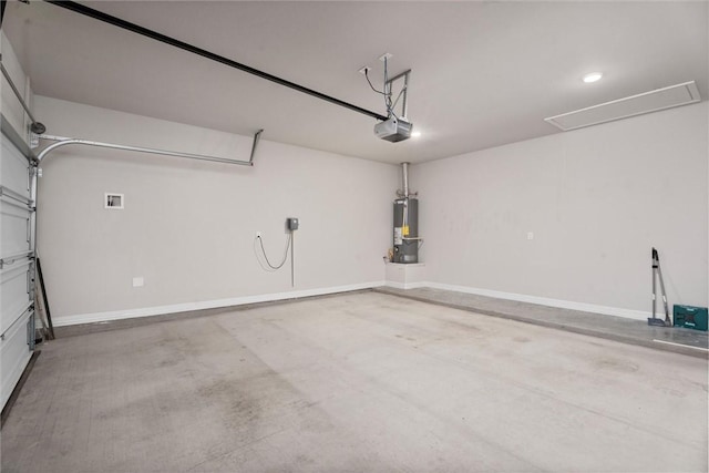3008 Alpha Ct, Bryan, TX 77808 - garage featuring gas water heater, a garage door opener, recessed lighting, and baseboards