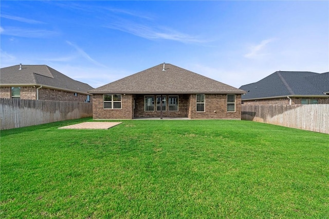 3008 Alpha Ct, Bryan, TX 77808 - back of house featuring brick siding, a patio area, and a shingled roof