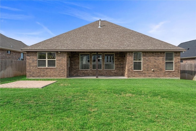 3008 Alpha Ct, Bryan, TX 77808 - back of property featuring a patio area, roof with shingles, and brick siding