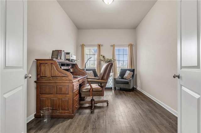 home office with dark wood-type flooring