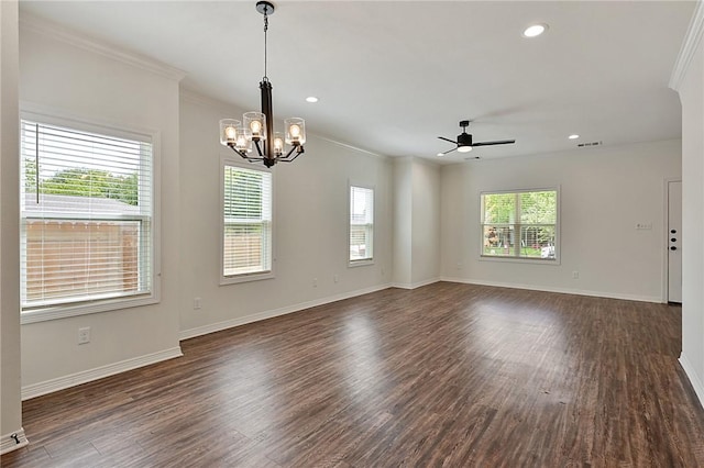 spare room featuring baseboards, dark wood-style flooring, crown molding, and ceiling fan with notable chandelier