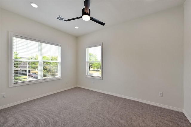 empty room featuring baseboards, carpet floors, recessed lighting, and ceiling fan