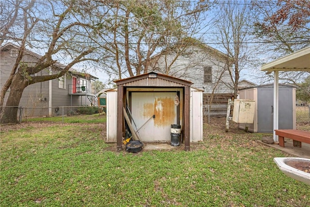 view of shed featuring a fenced backyard