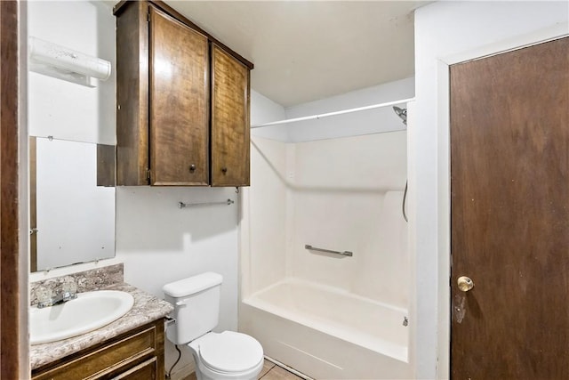 full bathroom featuring bathing tub / shower combination, toilet, tile patterned flooring, and vanity