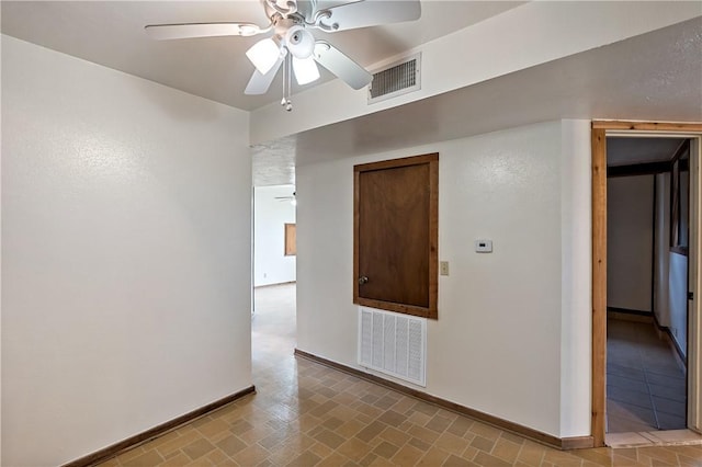 unfurnished room featuring ceiling fan