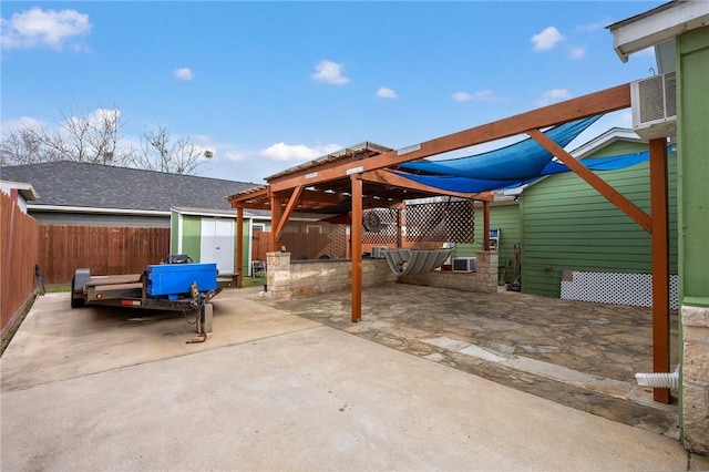 view of patio / terrace with a shed