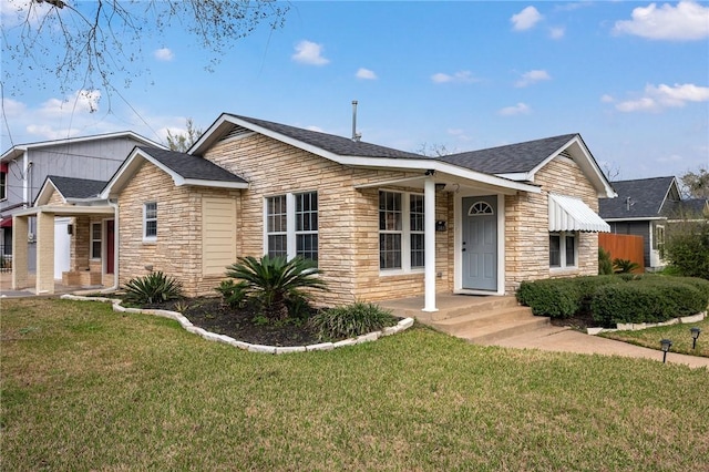 ranch-style house with a front lawn