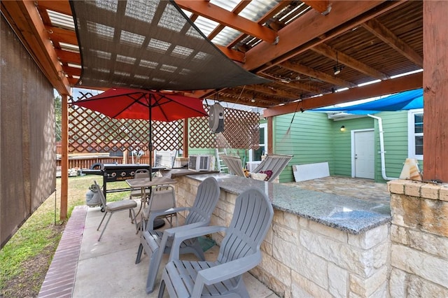 view of patio / terrace with a bar