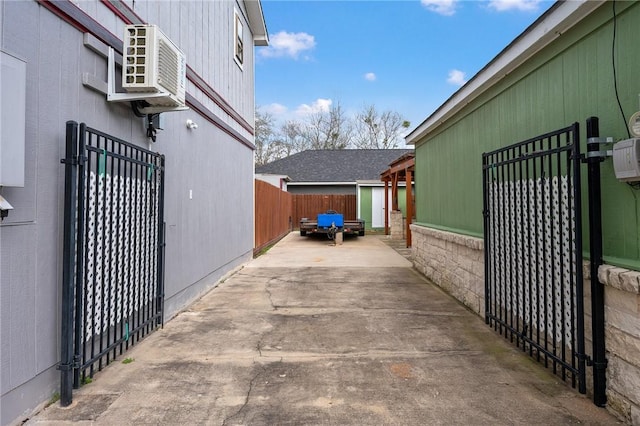 view of side of home with a patio area