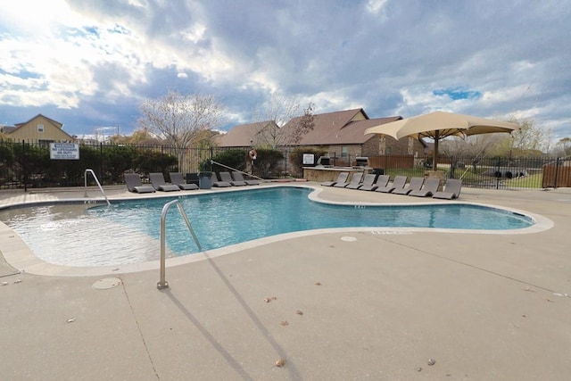 view of pool featuring a patio area