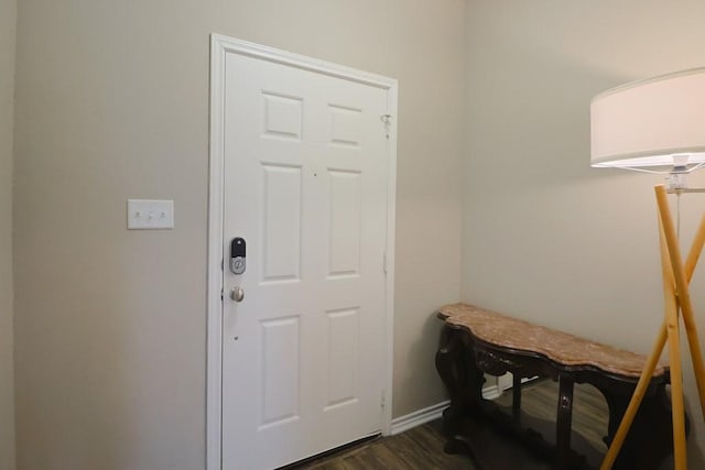 foyer with dark hardwood / wood-style flooring