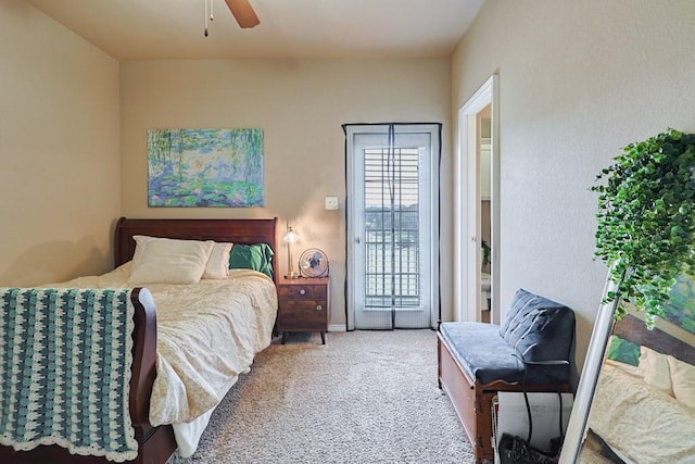 bedroom with carpet floors, ceiling fan, and access to outside