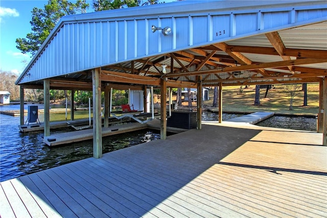 view of dock with a water view and boat lift