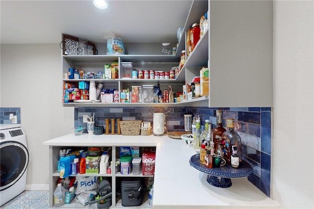 storage area featuring washer / clothes dryer