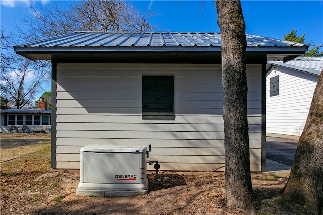 view of home's exterior featuring metal roof