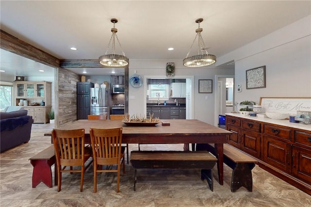 dining space with recessed lighting