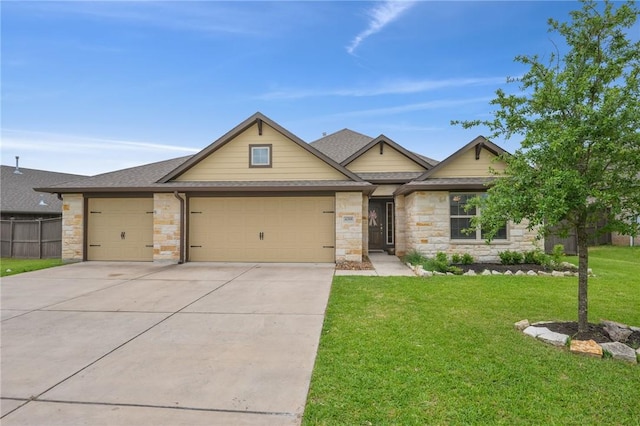 view of front facade with stone siding, concrete driveway, a front lawn, and a garage