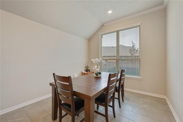 dining space with recessed lighting, lofted ceiling, baseboards, light tile patterned flooring, and crown molding
