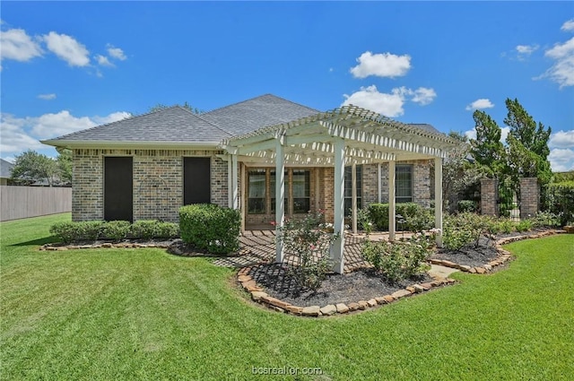 back of house with a pergola and a yard