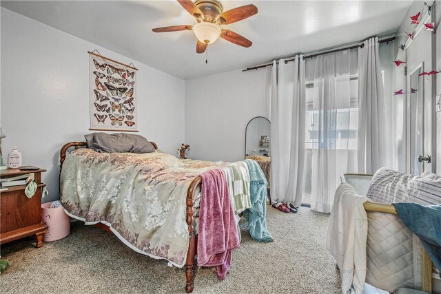 1902 Dartmouth St Unit O2, College Station, TX 77840 - carpeted bedroom featuring a ceiling fan and access to outside