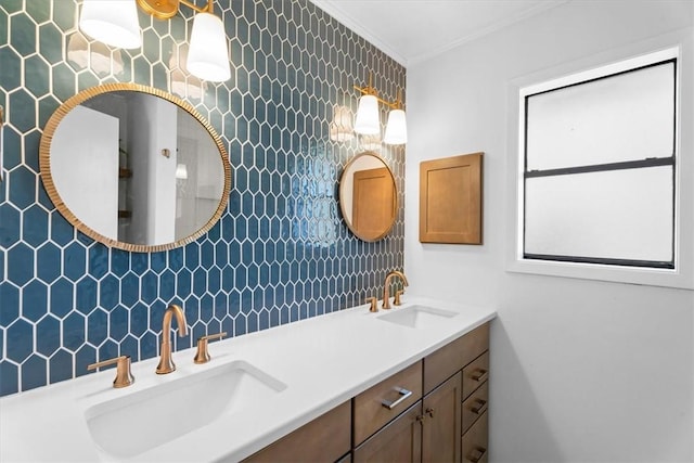 bathroom featuring crown molding and vanity