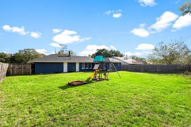 view of yard with a playground