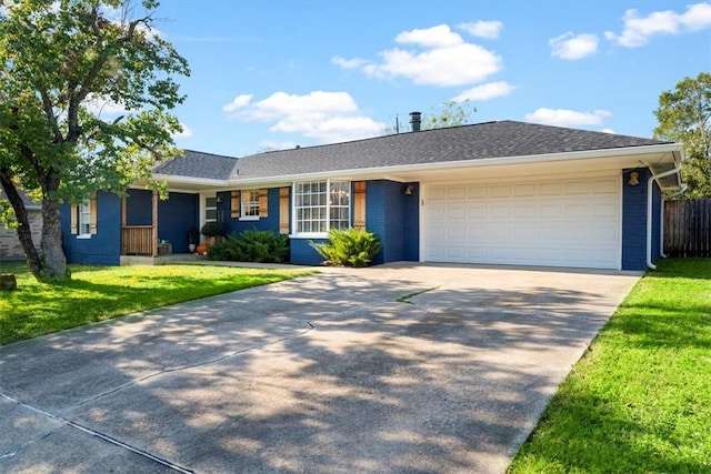 single story home with a front lawn and a garage