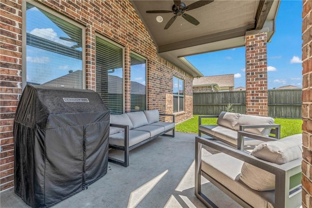 view of patio / terrace featuring outdoor lounge area, ceiling fan, and grilling area