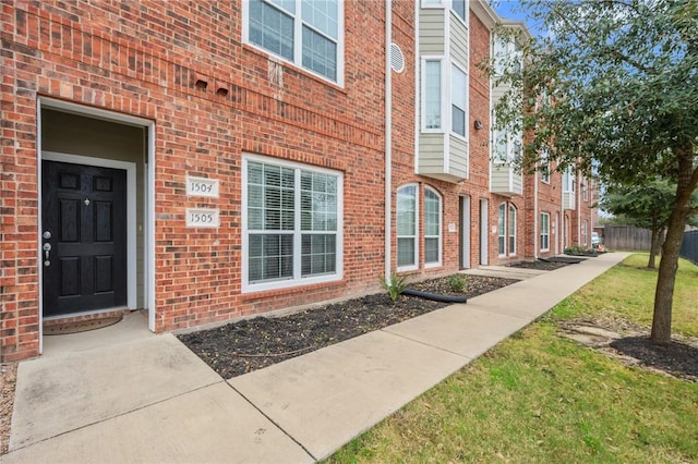 1198 Jones Butler Rd, College Station, TX 77840 - view of exterior entry with a lawn