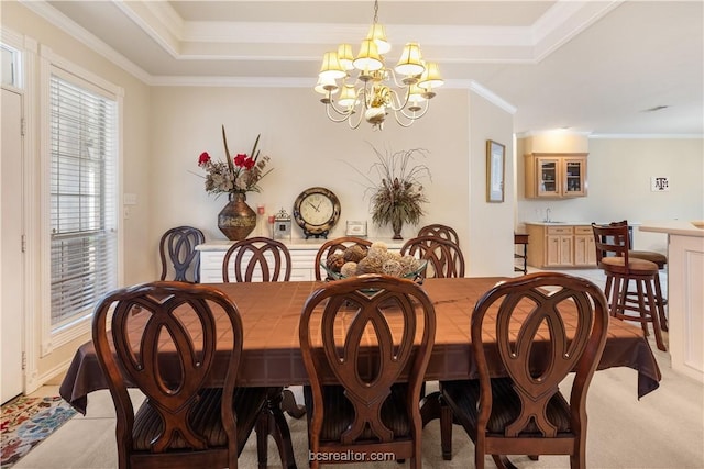 4718 Stonebriar Cir, College Station, TX 77845 - dining room with light colored carpet, crown molding, and an inviting chandelier
