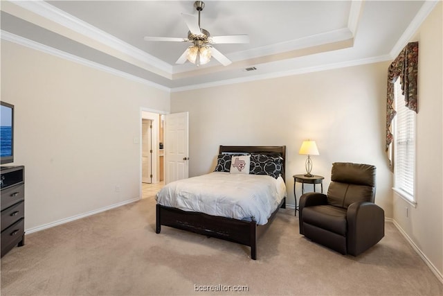 4718 Stonebriar Cir, College Station, TX 77845 - bedroom with ceiling fan, ornamental molding, light carpet, and a tray ceiling