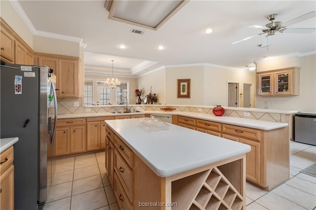 4718 Stonebriar Cir, College Station, TX 77845 - kitchen featuring sink, stainless steel appliances, kitchen peninsula, decorative light fixtures, and a kitchen island