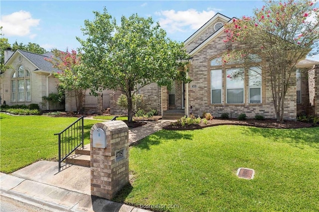 view of front of house with a front lawn