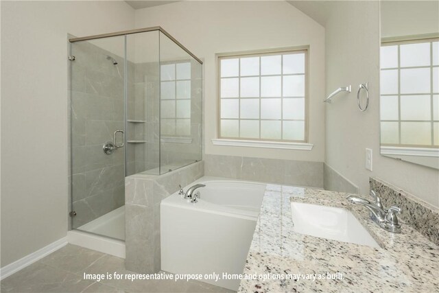 bathroom featuring sink, tile patterned flooring, and shower with separate bathtub