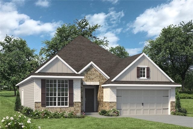 view of front of property with a front lawn and a garage