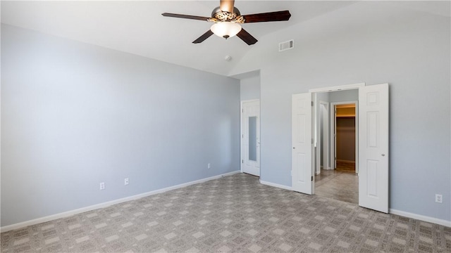 unfurnished bedroom with baseboards, visible vents, high vaulted ceiling, ceiling fan, and carpet flooring