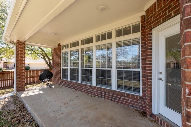 view of patio with fence