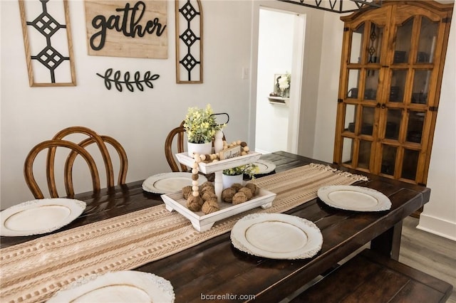 dining room with hardwood / wood-style floors