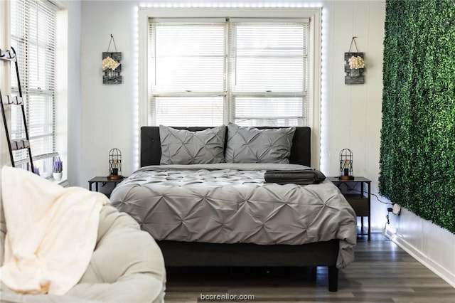 bedroom featuring hardwood / wood-style floors