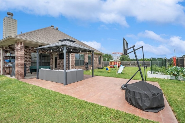 3901 Lienz Ln, College Station, TX 77845 - view of patio featuring a gazebo, an outdoor hangout area, and a playground