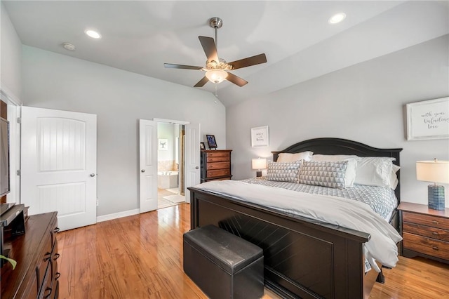 3901 Lienz Ln, College Station, TX 77845 - bedroom featuring lofted ceiling, light wood-style floors, baseboards, ceiling fan, and ensuite bathroom