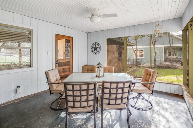 sunroom featuring plenty of natural light and ceiling fan