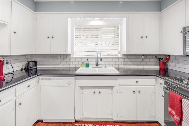 kitchen with range with gas stovetop, dishwasher, sink, and white cabinets