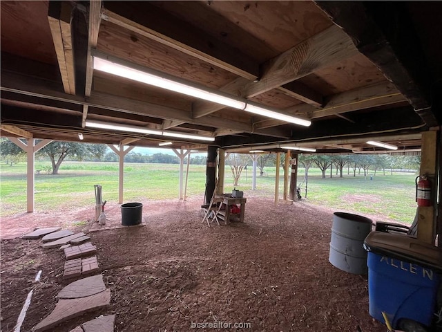 view of home's community featuring a yard and a rural view