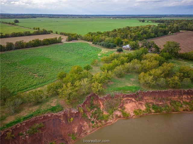 bird's eye view with a rural view and a water view