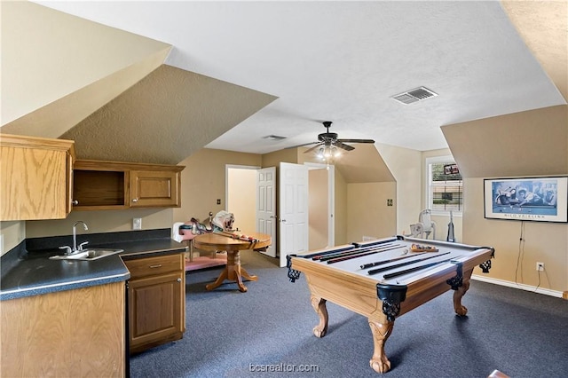 game room with carpet, a textured ceiling, ceiling fan, sink, and pool table