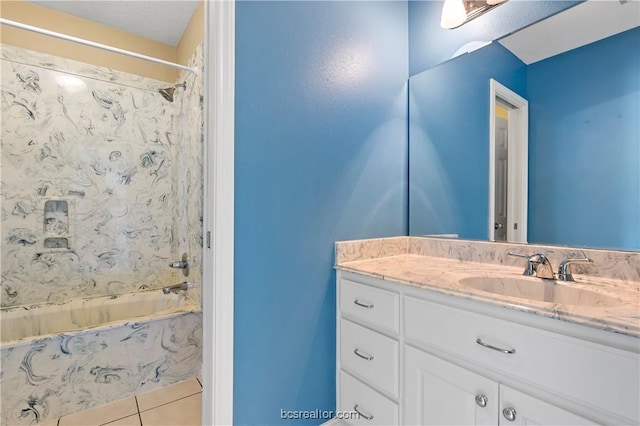 bathroom with tile patterned floors, vanity, and tub / shower combination