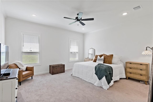 bedroom with light colored carpet, visible vents, ceiling fan, baseboards, and recessed lighting